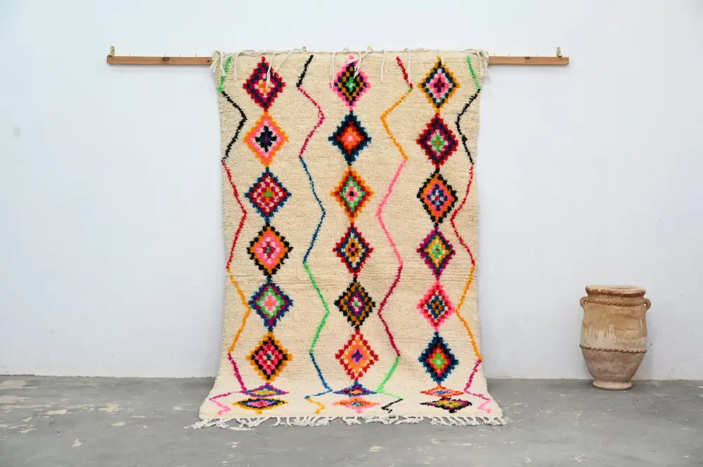 Beige decorbites™ handmade moroccan azilal rug with vibrant pink orange green and blue geometric patterns 246x142cm