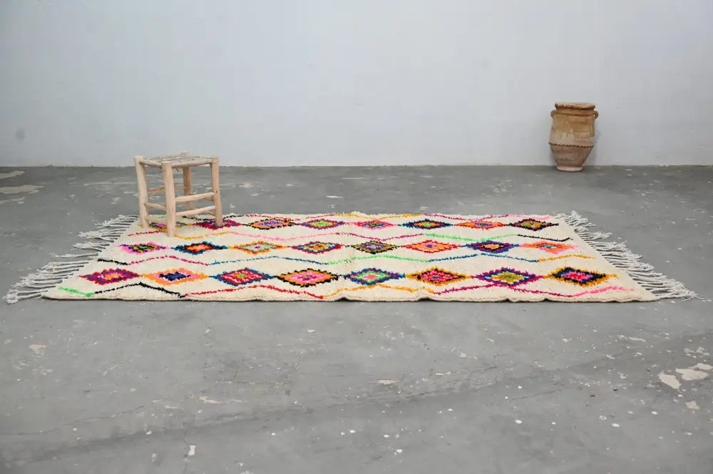 DecorBites™ handmade Moroccan azilal rug 246x142cm with cream base and colorful geometric traditional azilal patterns