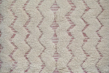 Cream-colored plush wool decorbites™ handmade traditional azilal rug with subtle muted pink geometric pattern 250x143cm