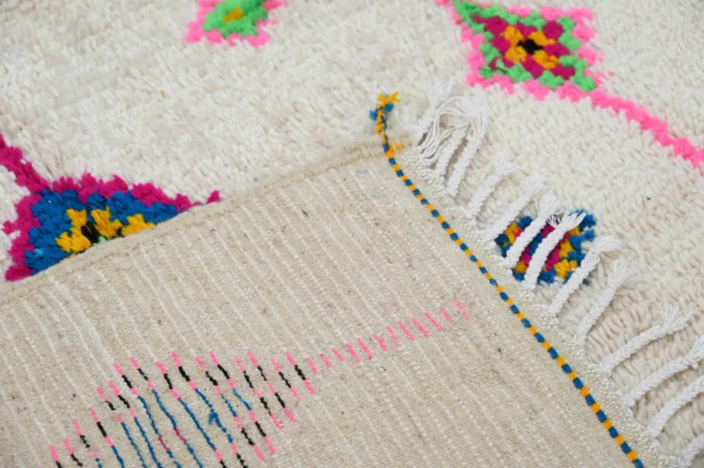 DecorBites™ handmade moroccan azilal rug with cream base, vibrant geometric patterns, and fringed edges 250x148 cm
