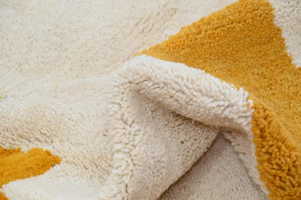 Cream and mustard yellow sherpa azilal rug with soft plush texture handcrafted in moroccan handmade traditional style