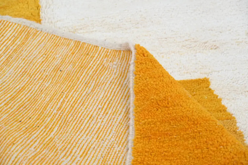 Decorbites™ handmade moroccan azilal rug 250x149 cm with plush mustard yellow looped pile and white fringe