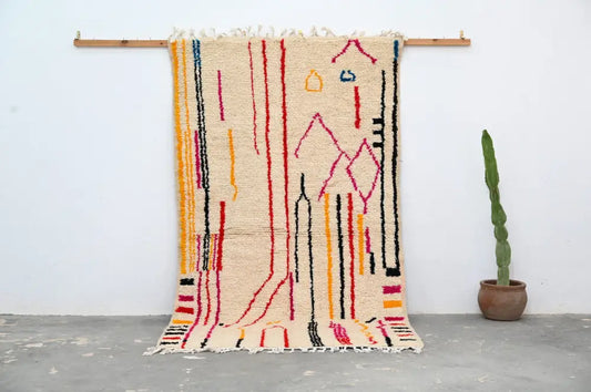 Beige DecorBites™ handmade traditional azilal rug with vibrant red orange yellow black and blue geometric patterns 253x144 cm fringe edge