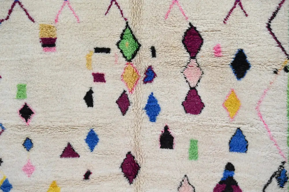 DecorBites™ handmade Moroccan Azilal rug cream color textured surface vibrant colors geometric patterns 300x205 cm