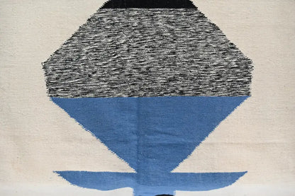 DecorBites handmade traditional azilal rug in black gray and blue geometric design showcasing Moroccan craftsmanship on off-white