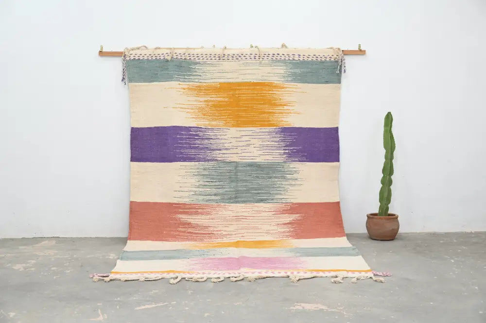 Colorful handmade moroccan azilal rug 302x197cm with horizontal stripes and textured fringed edges by decorbites