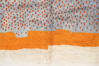 DecorBites™ handmade moroccan azilal rug 304 x 210 cm with a gray field dotted in orange and bold orange and white bands