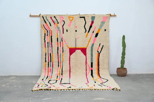 Beige handmade moroccan azilal rug with vibrant abstract geometric patterns in pink black orange and teal 315x194 cm