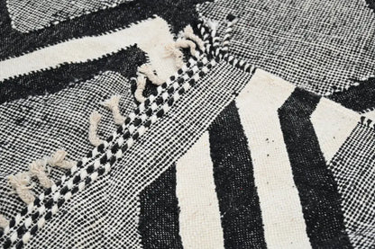 DecorBites handmade traditional azilal rug in black and white geometric pattern with fringed edges 326x203 cm