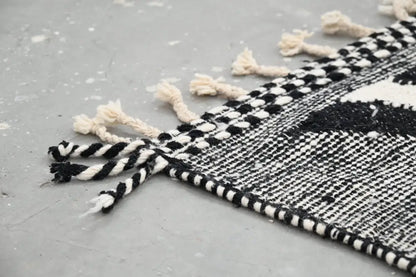 DecorBites™ handmade traditional azilal rug black and white woven with fringed edges 326x203 cm