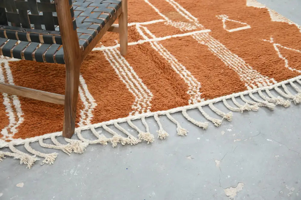 DecorBites™ handmade traditional azilal rug in orange and cream with geometric patterns and fringed edge 328x197cm