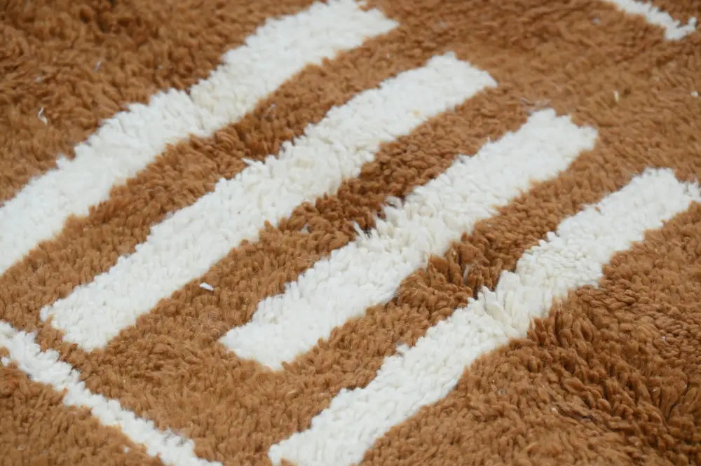 A plush brown and white striped traditional azilal rug with soft shaggy texture by decorbites, 328x197cm