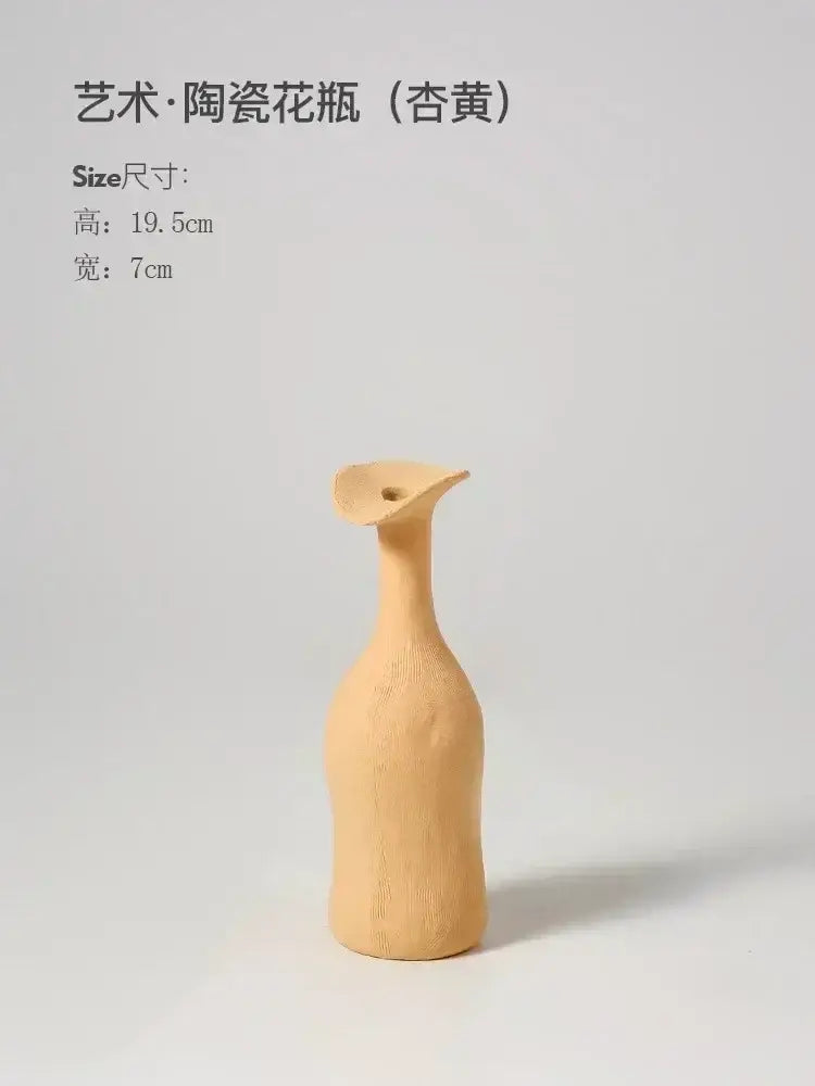 DecorBites™ handmade beige ceramic flower vase with a slender curved neck and flared opening for luxury home decor