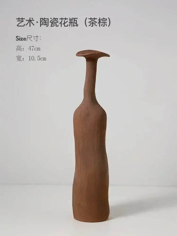 Decorbites handmade nordic ceramic flower vase with a tall, slender, matte tea brown finish for luxury home decor