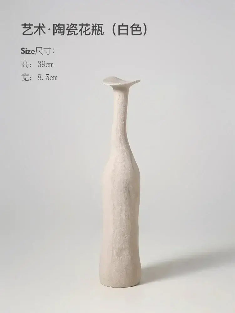 A tall white ceramic flower vase with a smooth textured surface and elongated neck by DecorBites™ for luxury home
