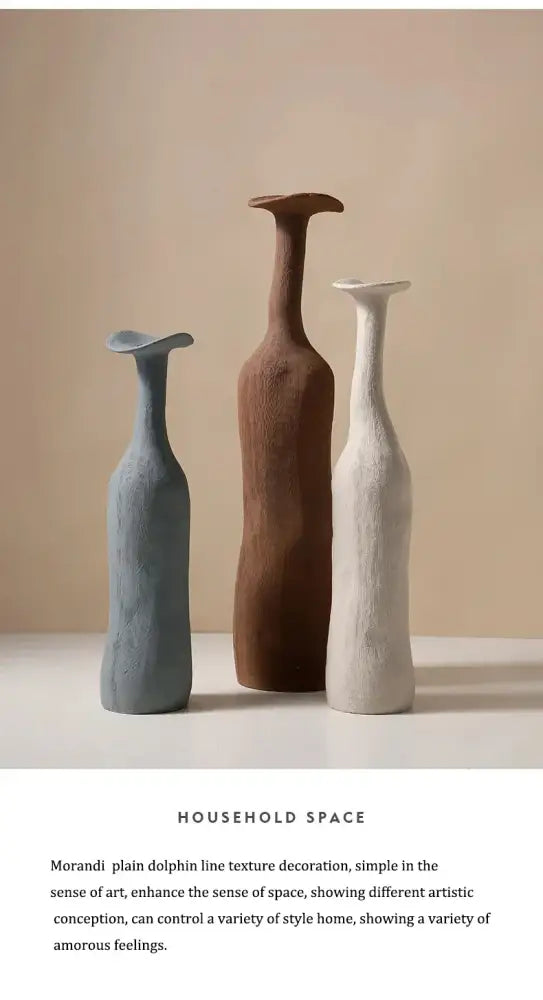 Three handcrafted ceramic flower vases by decorbites in muted gray brown and off-white with textured dolphin-line contours