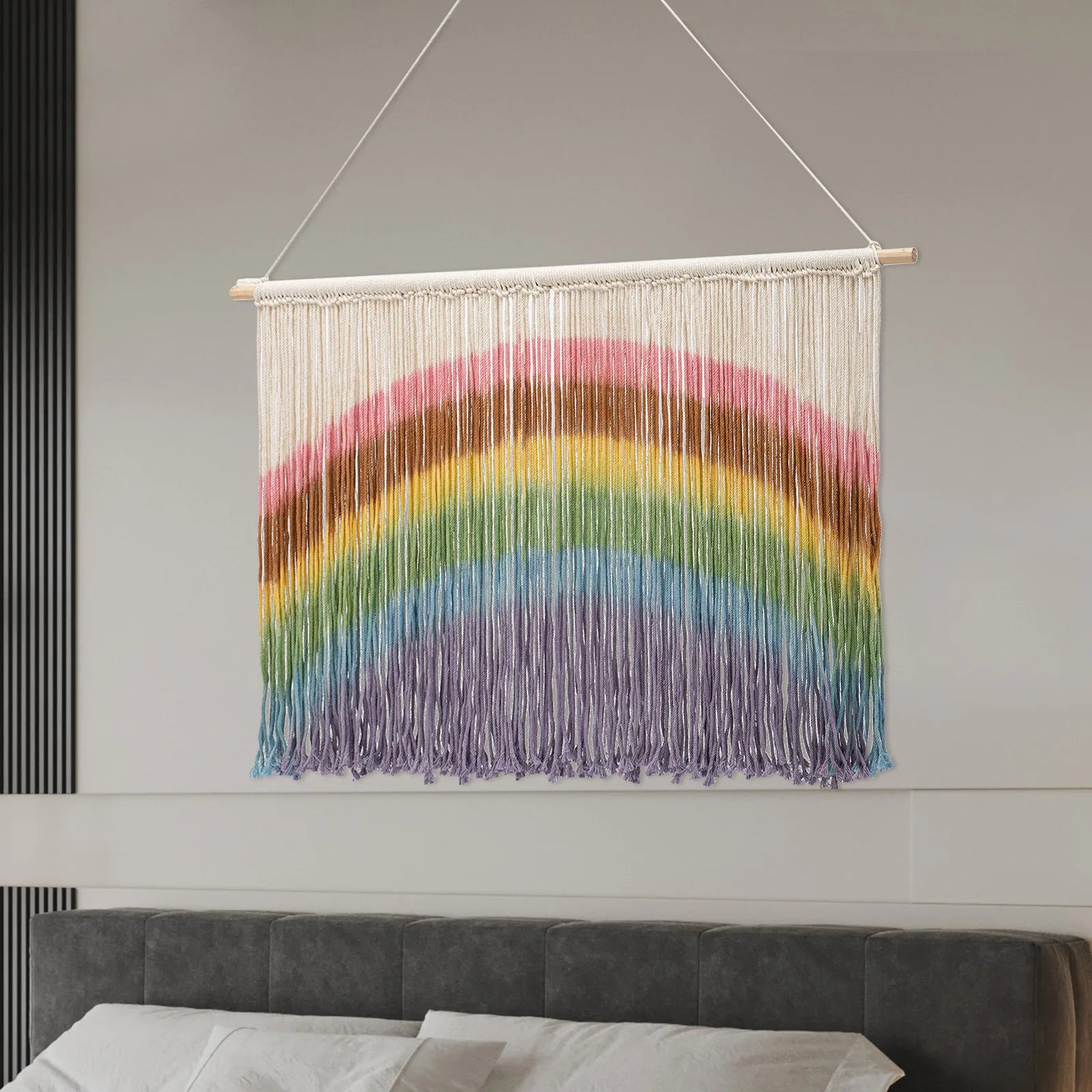 Colorful handmade weaving macrame wall hanging with rainbow stripes and wooden dowel for wall decor by decorbites