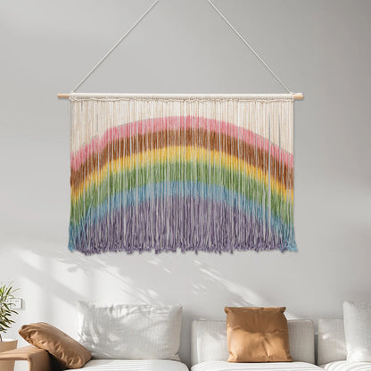 Colorful handmade weaving rainbow macrame wall hanging with wooden dowel and vibrant yarn strands for wall decor