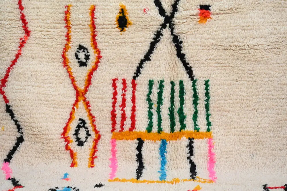 Beige handwoven moroccan azilal rug with vibrant red orange green pink black and yellow geometric patterns 245x146 cm