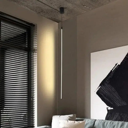 DecorBites™ hanging pendant lights with matte black fixture and slender white tube for bedroom lighting