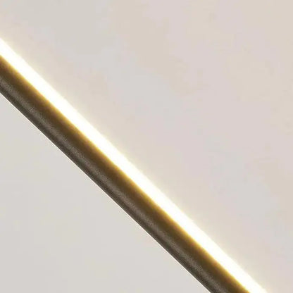 A sleek decorbites™ hanging pendant light with warm led strip glow and metallic casing for bedroom use