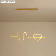 Gold-toned metal led pendant light shaped like an electrocardiogram line ending in a heart for dining room use