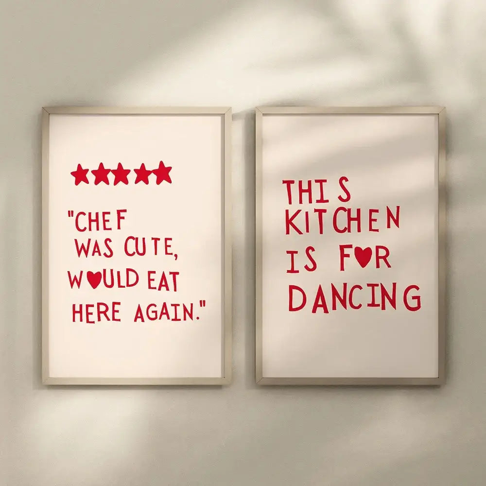 Two framed DecorBites™ wall art prints with heart red quote text on off-white backgrounds for kitchen decor