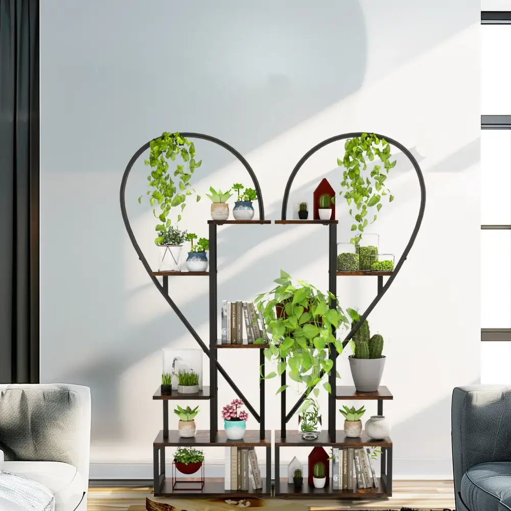Black metal heart shaped 6 tier plant stand with wooden shelves and planters by DecorBites™