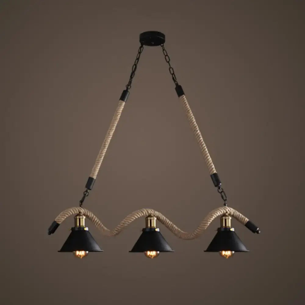 Black industrial hanging lamp with hemp rope suspension and brass accents antique wrapped hanging ideal for restaurants