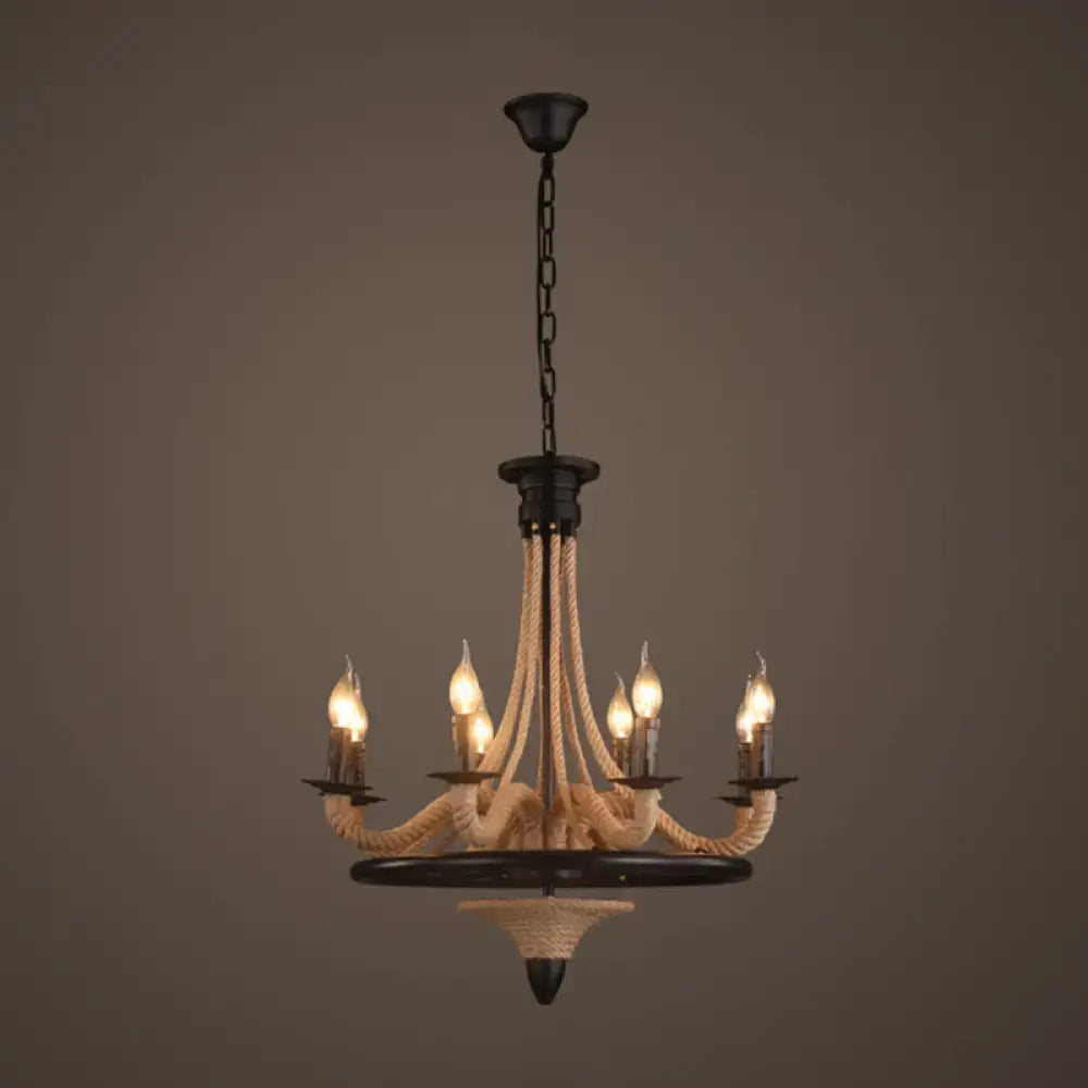 Black metal hanging lamp with cream hemp rope antique wrapped arms and five lit candle-style bulbs by DecorBites for restaurants