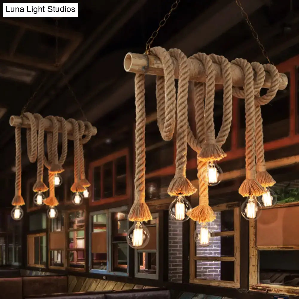Rustic industrial pendant light featuring hemp rope wrapped bamboo tube with clear glass bulbs in flaxen color