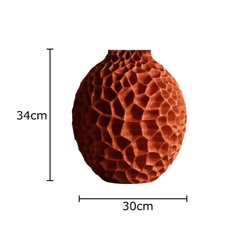 A terracotta ceramic decorbites honeycomb vase with a textured honeycomb surface for office desk decor