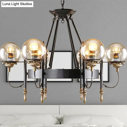 DecorBites industrial 6-light clear glass globe chandelier with amber bulbs black metal frame gold accents for living room