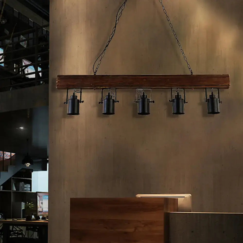 DecorBites™ industrial black metal island light fixture with wooden beam and five spotlights hanging by chain cord