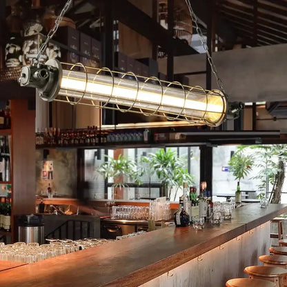 Decorbites industrial chandelier with a long glass tube encased in a metal cage suspended by chains for cafe lofts
