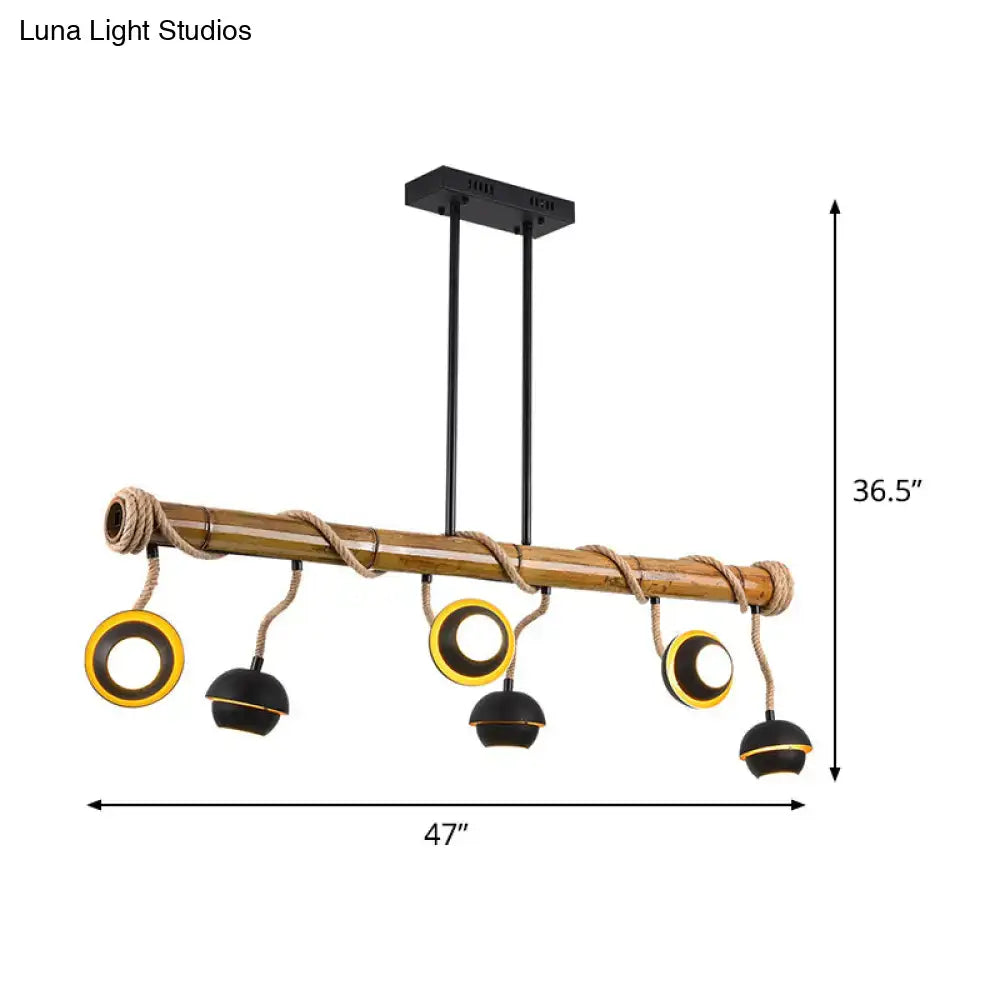 Rustic bamboo chandelier with black iron and gold accents industrial linear island pendant lamp with rope detail