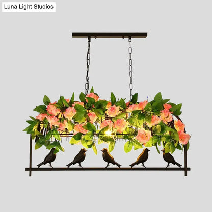 Black metal industrial metal birdcage flower hanging ceiling light with pink roses green leaves and bird silhouettes