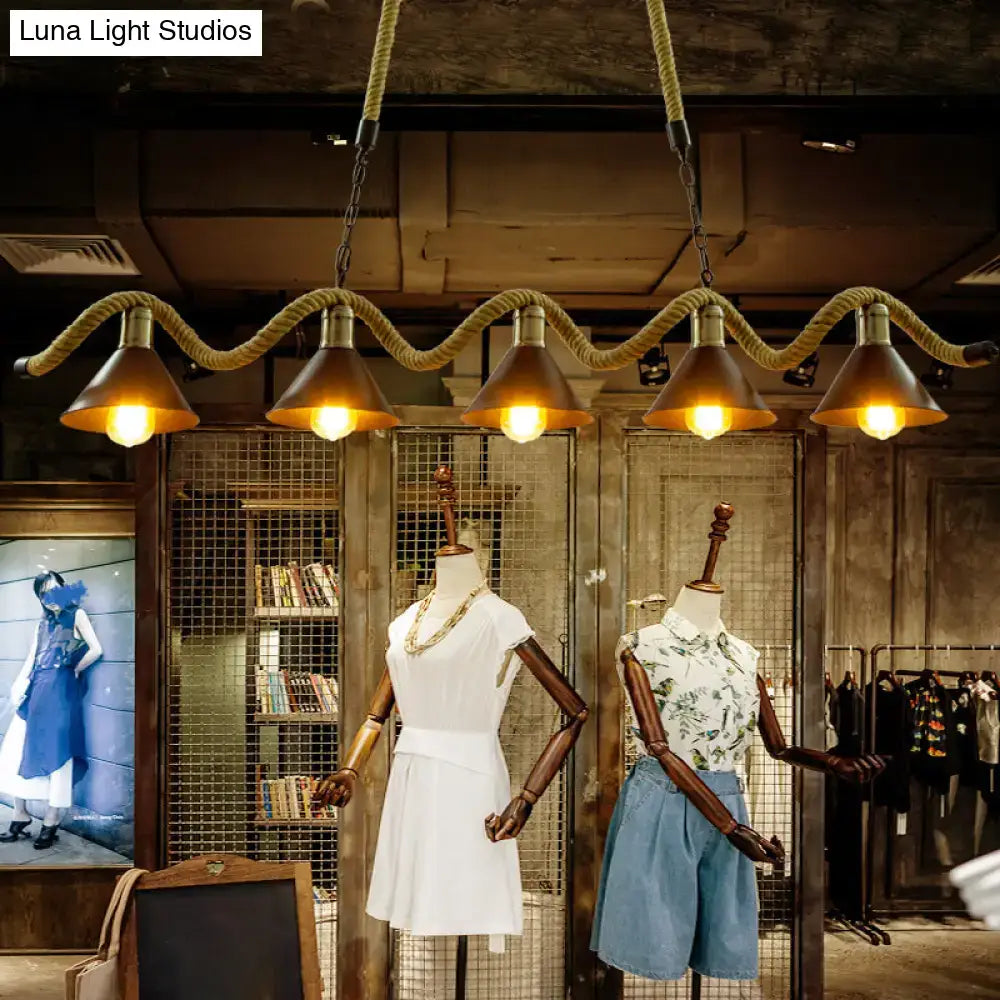 DecorBites industrial metal bistro island lighting with black conical hanging light and hemp rope suspension