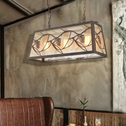 DecorBites™ industrial rectangular pendant light with bronze metal frame, frosted glass panels, and pinecone cutouts