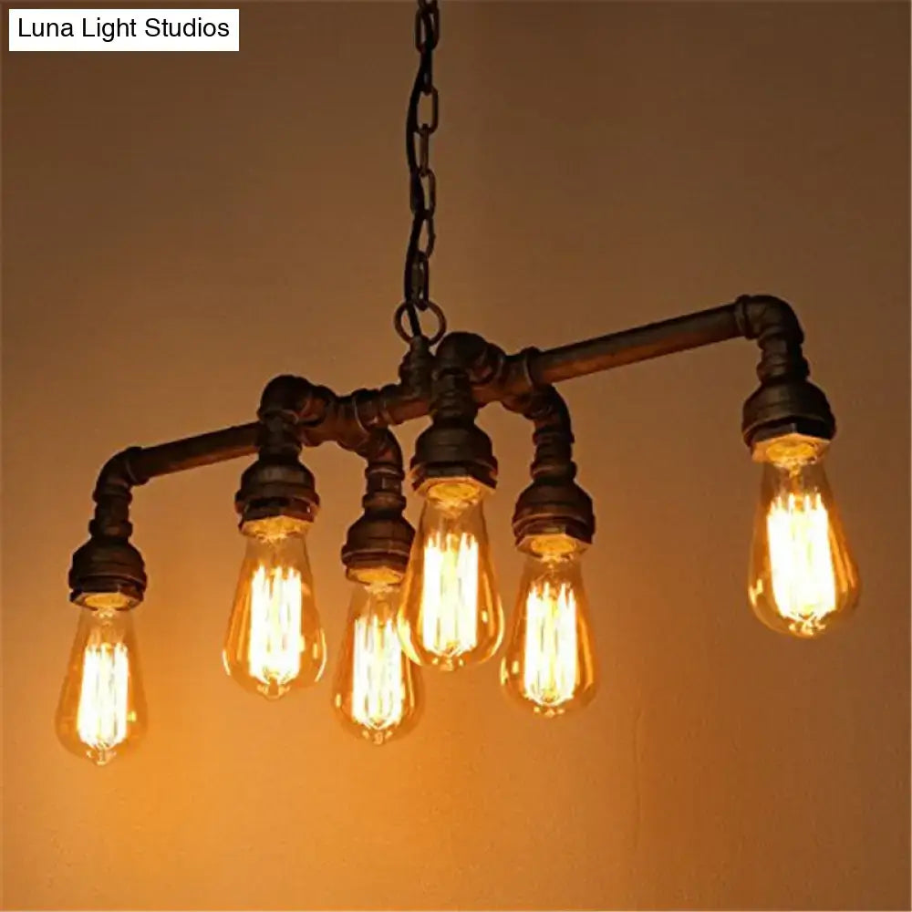 DecorBites™ industrial metal pipe pendant with five glowing amber led incandescent bulbs for dining room lighting