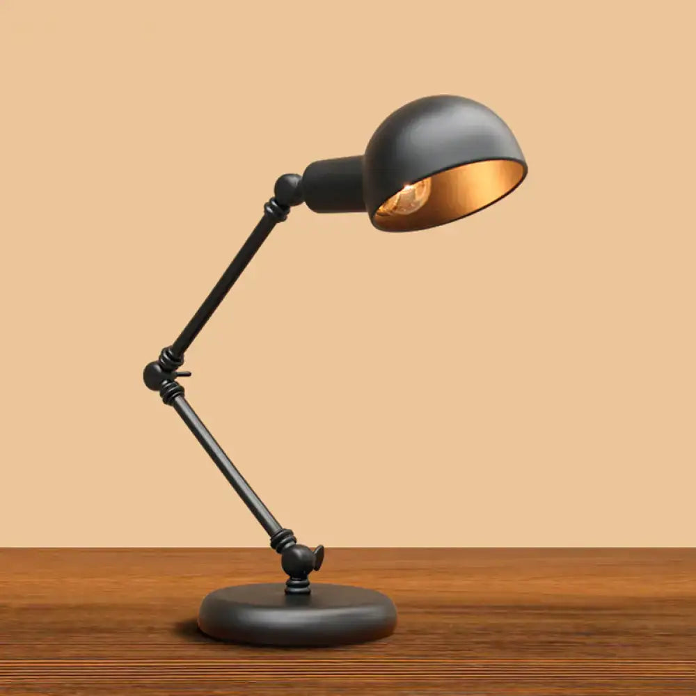 Black metal DecorBites™ industrial metal swing arm table lamp with gold-lined dome shade and 3-joint swing arm