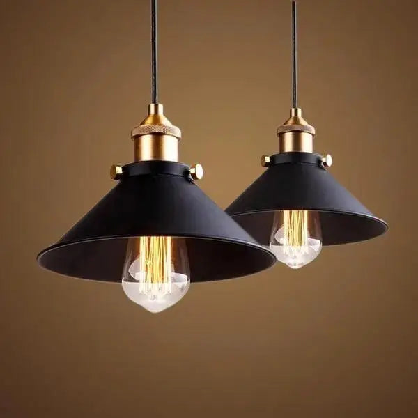 Black metal pendant light with brass accents and exposed filament bulbs from decorbites industrial pendant lighting