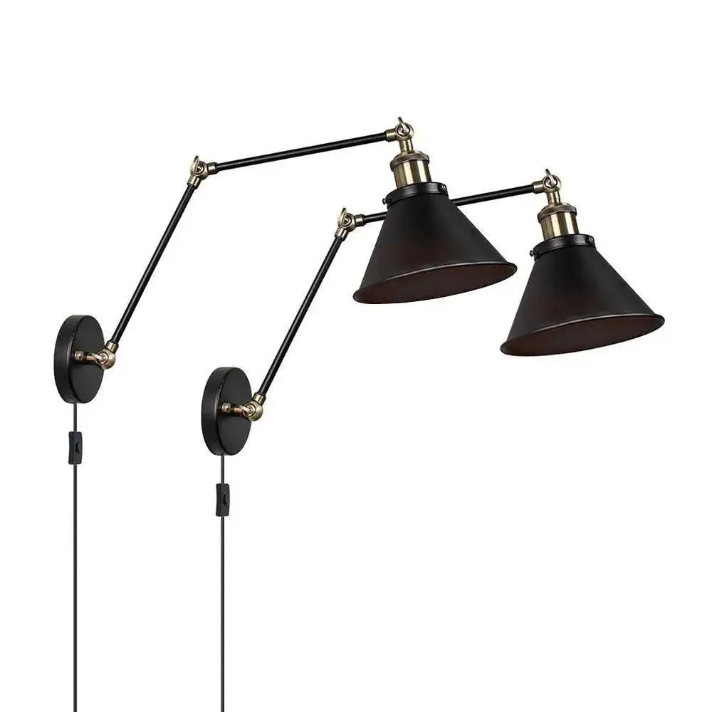 DecorBites™ industrial plug in wall sconce in black with adjustable arms and brass accents for commercial space lighting