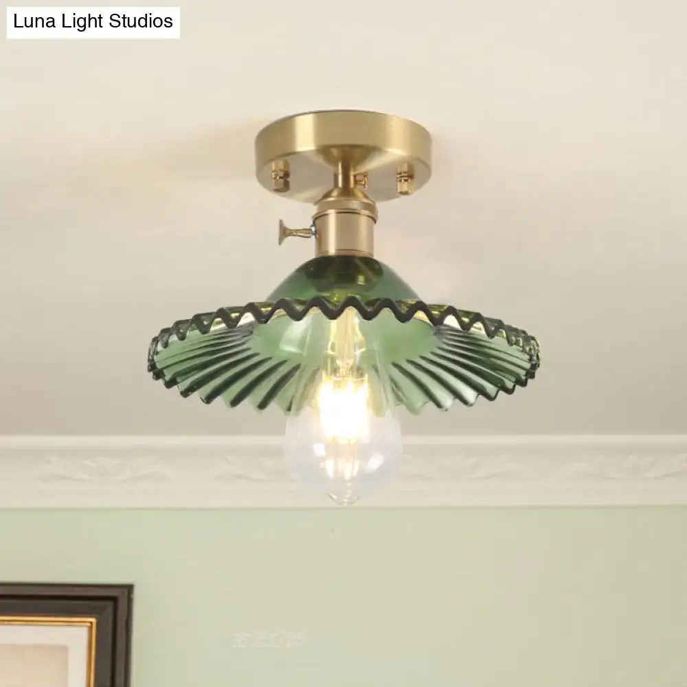 Green ribbed glass one-light ceiling light with scalloped ribbed glass and brass-finished mounting base from decorbites