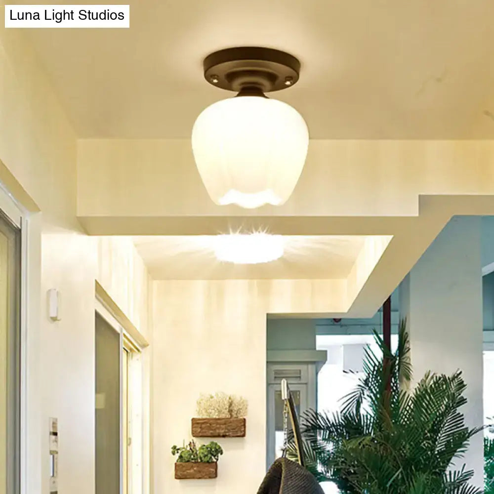 DecorBites industrial semi flush light with warm-toned black opal glass globe and dark bronze metal base for corridor lighting