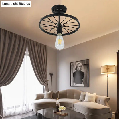 DecorBites™ industrial style semi-flush mount ceiling light with black finish and vintage bicycle wheel design