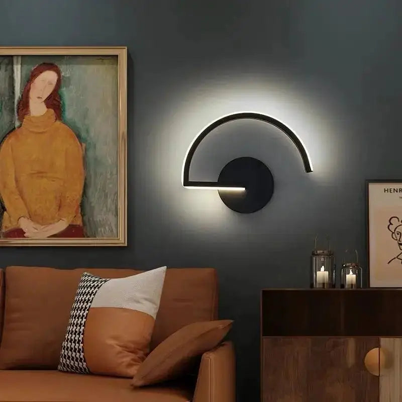 Modern black curved ingegerd wall lamp with sleek minimalist design and integrated led lighting by decorbites