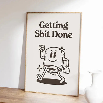 A framed DecorBites™ inspirational quote poster featuring a black and white animated marshmallow design in a light wood frame