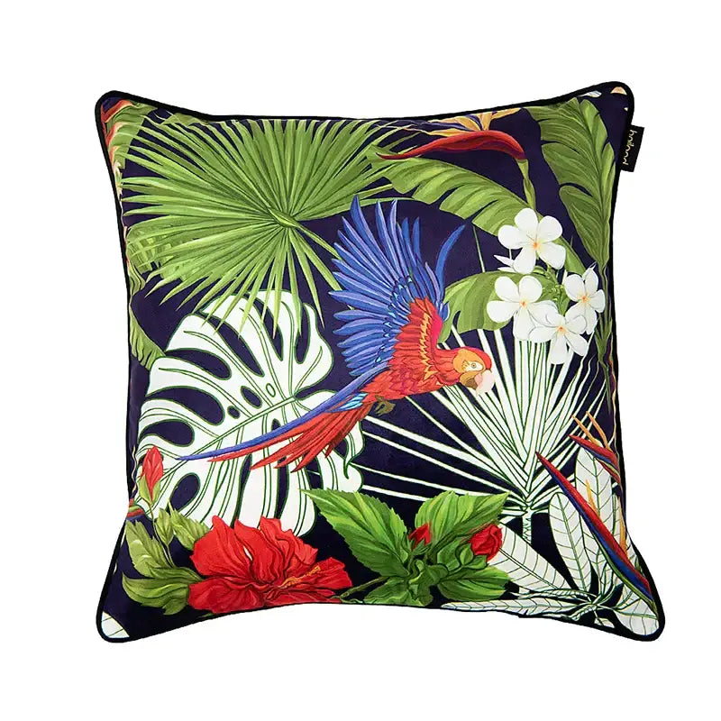 Square cushion cover with vibrant tropical red and blue macaw print on navy decorbites intersecting geometric velvet