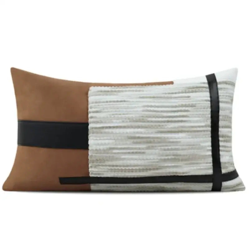 Rectangular decorbites italian luxury pillowcase with tan suede, white textured fabric, and black leather strips for living room